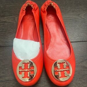 Tory Burch Women's Bright Orange Flats with Gold Logo